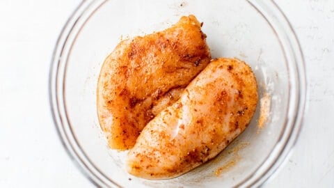 Two raw pieces of meat in a bowl