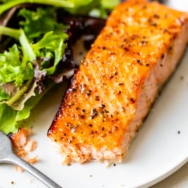 a plate with crispy air fryer salmon