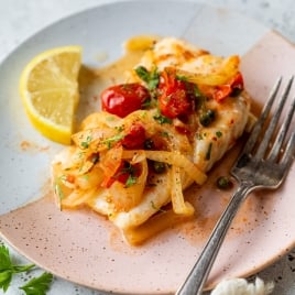 Baked cod on plate
