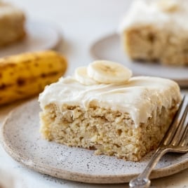 Slice of banana cake on plate