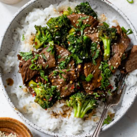Broccoli beef recipe in bowl served over rice