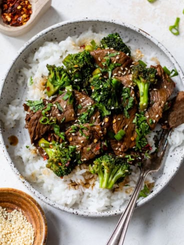 Broccoli beef recipe in bowl served over rice