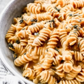 a bowl of creamy butternut squash pasta