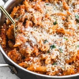 a pan of cheesy chicken parmesan pasta
