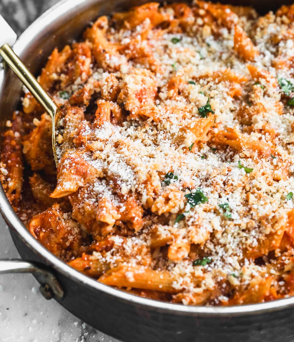 a pan of cheesy chicken parmesan pasta
