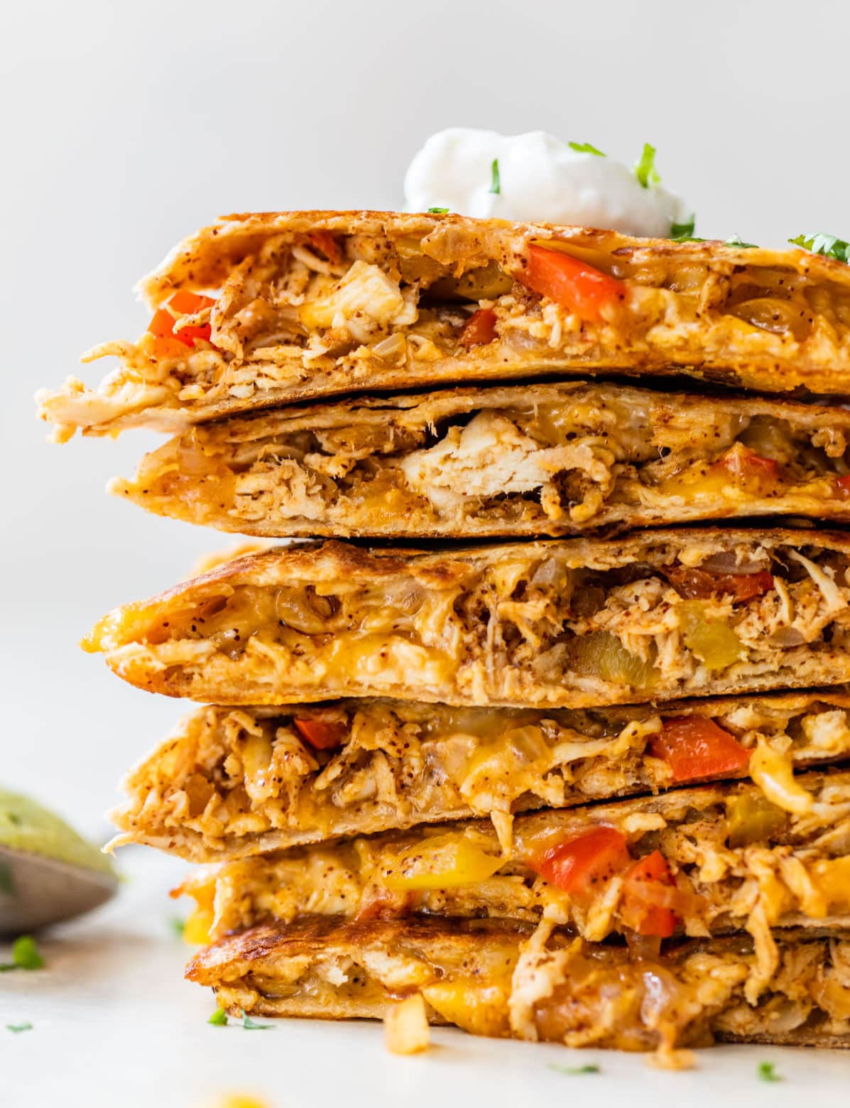 A stack of chicken quesadilla pieces