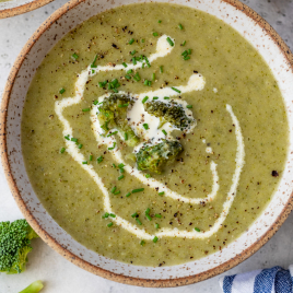 Overhead view of cream of broccoli soup in bowl