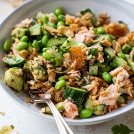 Crispy rice salad with salmon in bowl