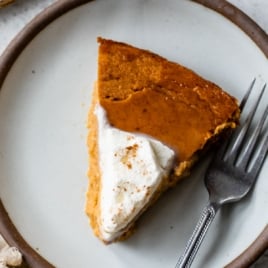 a slice of the best easy crustless pumpkin pie