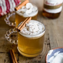 a glass of classic hot buttered rum recipe made with warm spices, butter, and sugar
