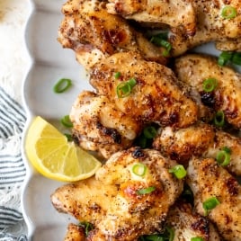 Crispy lemon pepper wings on platter