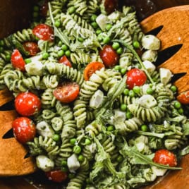 Large bowl of creamy pesto pasta salad