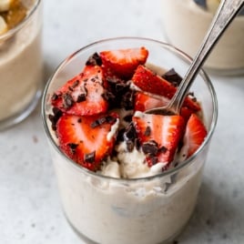 high-protein overnight oats topped with chocolate and strawberries