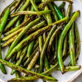 a plate with crispy sauteed green beans