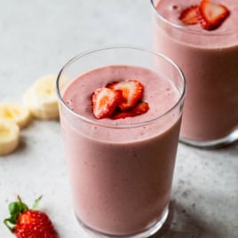 Two glasses of strawberry banana smoothie