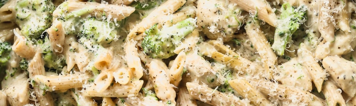 Creamy chicken broccoli alfredo in skillet