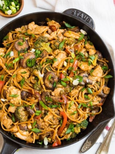 Chicken and noodle stir fry in a skillet