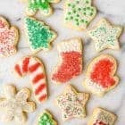 Soft and fluffy Cream Cheese Sugar Cookies with Perfect Icing. The only cut out cookie recipe you will ever need!