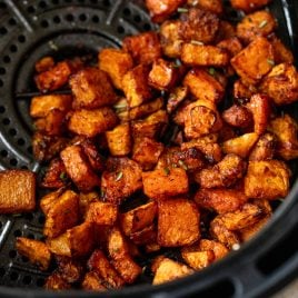 air fryer butternut squash cubes in an air fryer