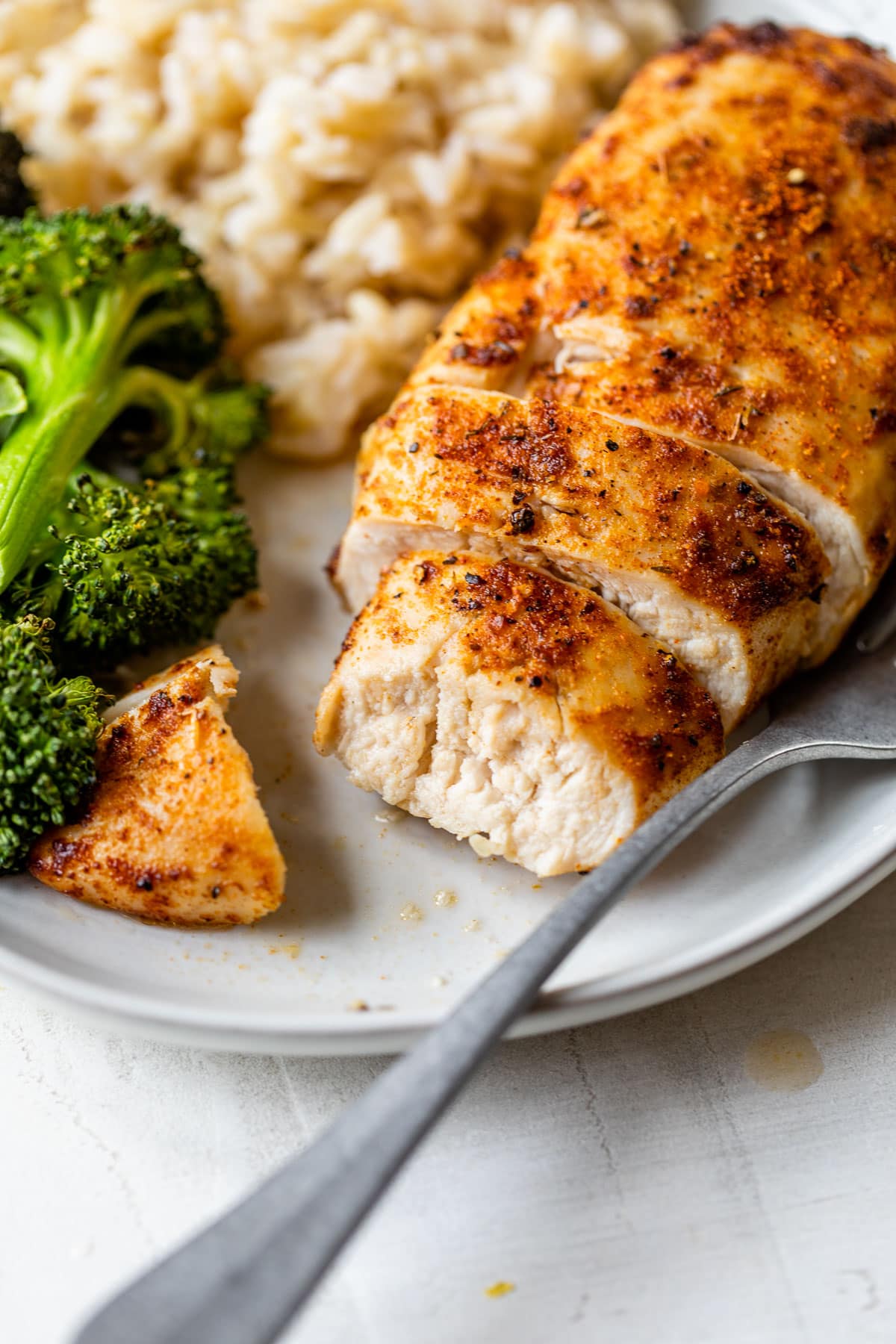 A sliced air fryer chicken breast