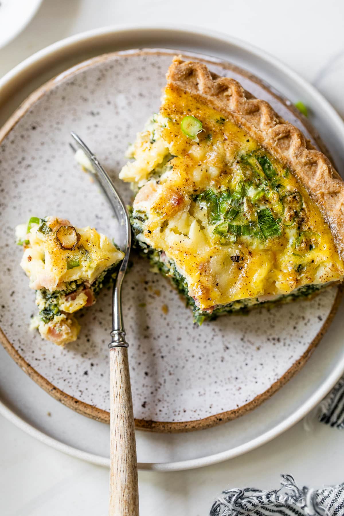 a slice of easy quiche with cheese