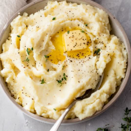 Overhead view of garlic mashed potatoes in bowl