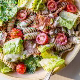 blt pasta salad with dressing and spinach