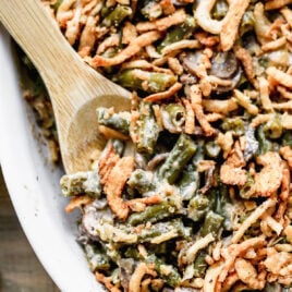A baking dish of crockpot green bean casserole