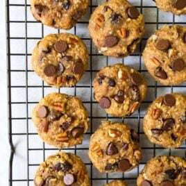 Clean eating Healthy Oatmeal Cookies with applesauce, honey, chocolate, and raisins. NO SUGAR, low calorie, and kid-friendly, these soft, chewy cookies are the perfect healthy dessert or even snack.