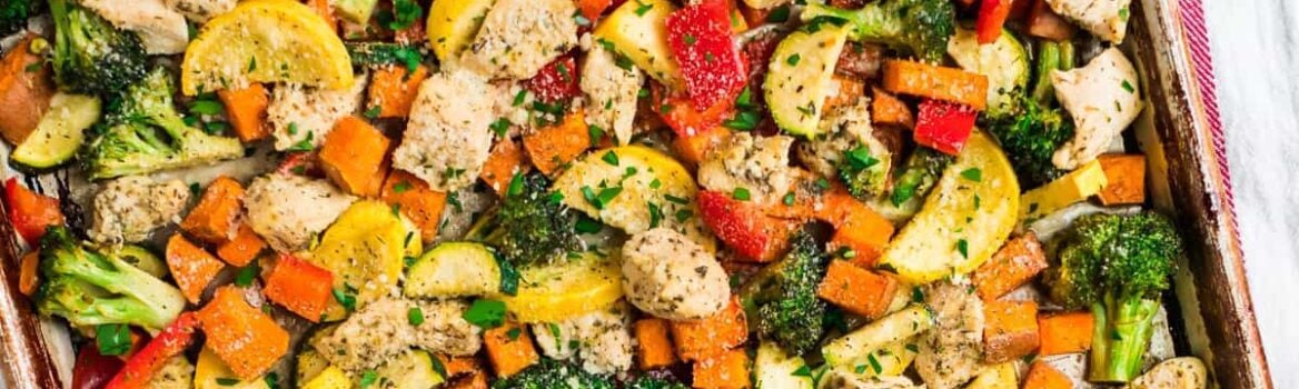A sheet pan dinner with chicken and vegetables