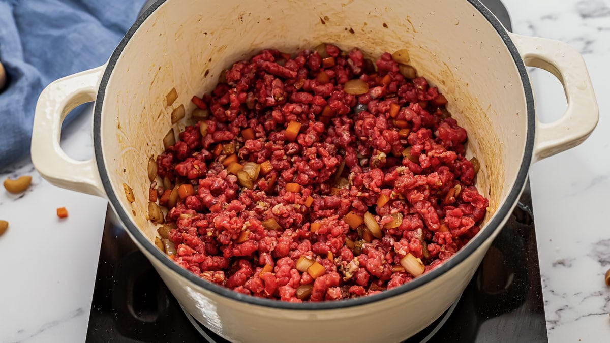 Hamburger helper ingredients in a pot
