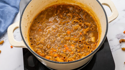 Hamburger helper simmering in a pot