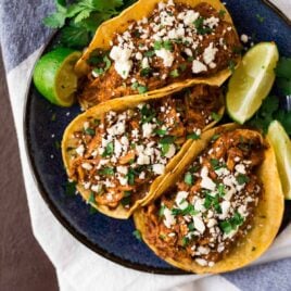 Easy Instant Pot Chicken Mole from scratch! Quick recipe that tastes authentic but is made fast in the Instant Pot. Perfect for Mexican enchiladas, tacos, and rice.