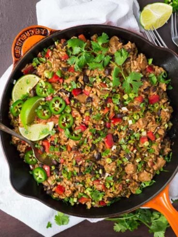 Healthy One Pot Mexican Chicken and Rice Skillet. Easy recipe that’s perfect for weeknight dinners! Fast clean up and a great way to use up ingredients you already have on hand {gluten free} Recipe at wellplated.com
