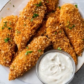 a plate of breaded chicken tenders