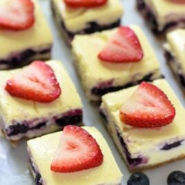 Red White and Blueberry Cheesecake Bars. The perfect dessert for the Fourth of July!