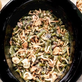 A slow cooker with vegetables