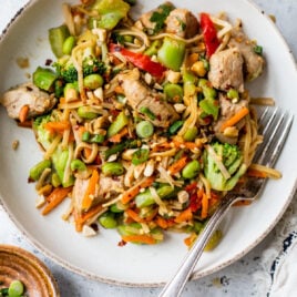 Healthy Pork Stir Fry with Peanut Noodles and vegetables on a plate