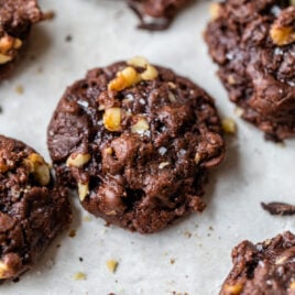 chewy brownie cookies on a piece of parchment paper